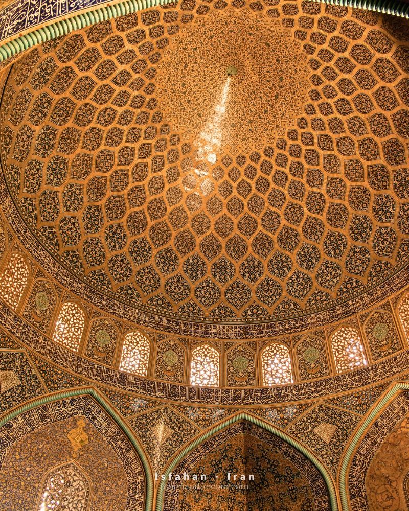 The dreamlike tilework of the main courtyard of Sheikh Lotfollah Khan Mosque, tucked in the corner of Naqsh-e Jahan Square in Isfahan, Iran