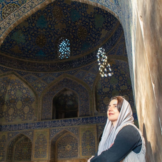 Woman Amidst Tilework