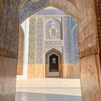 Golden tiles glow under the warm evening light in one of Imam Khomeini Mosque’s prayer halls, contrasting beautifully with the surrounding turquoise tiles. A magical play of sunlight and architecture.
