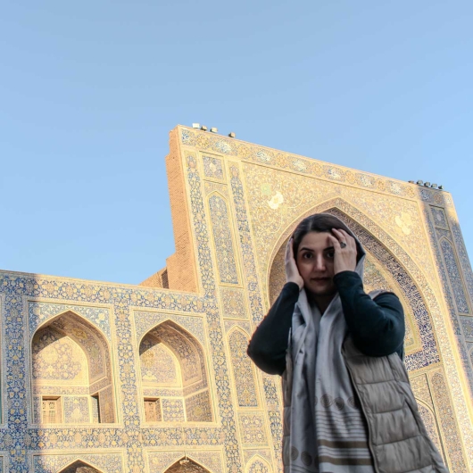 Woman in Mosque Courtyard